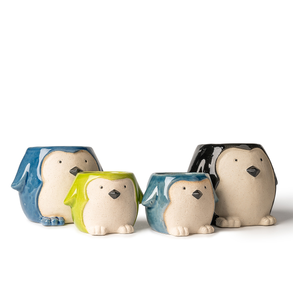 Bougeoirs en céramique en forme de pingouin : art de la lumière et des ombres adorable et confortable