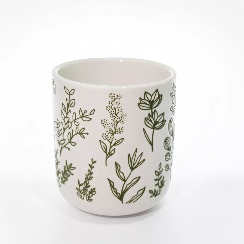 Tasse en grès blanc à imprimé botanique