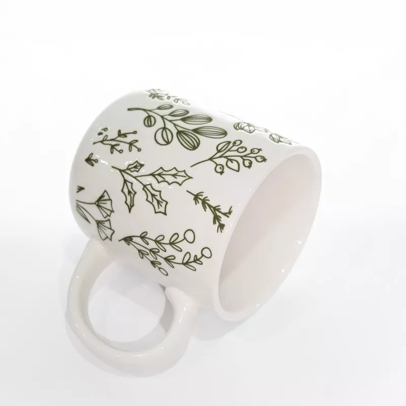 Tasse en grès blanc à imprimé botanique
